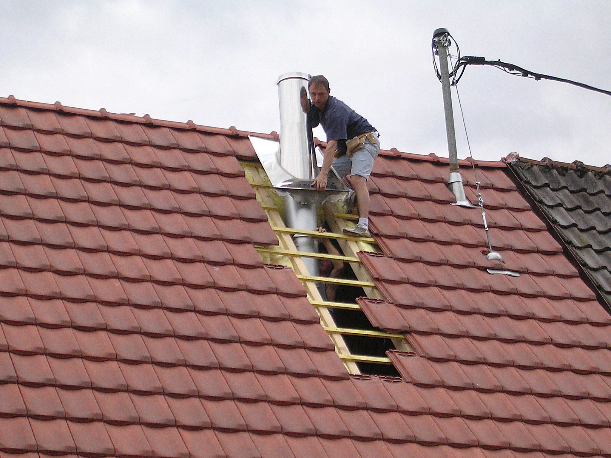 Mise en place conduit cheminée